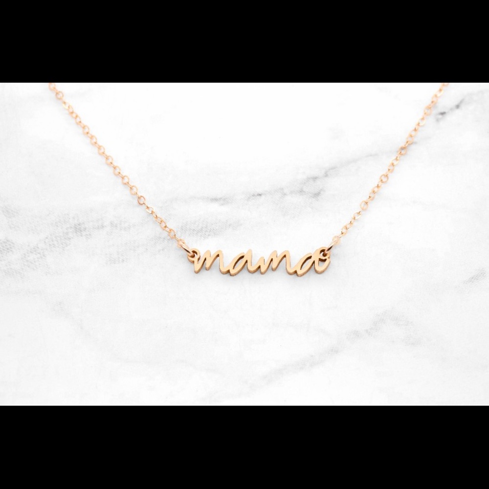 Gold plated mama necklace.